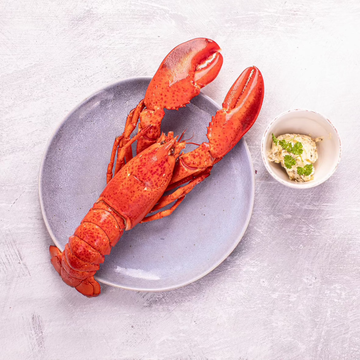 Gratineret hummer med citron og hvidløg (2 Personer)