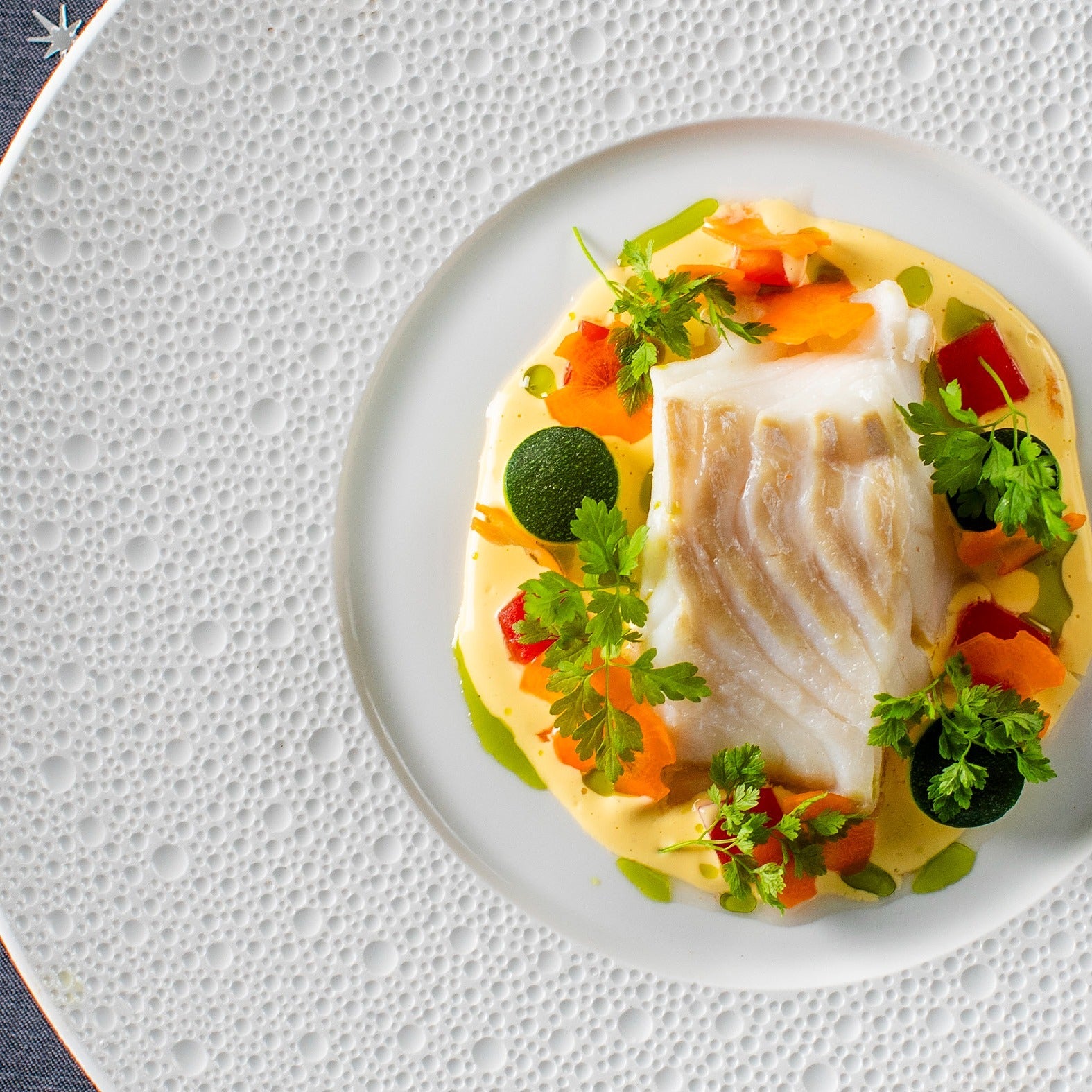 Dampet torsk i sauce nage med urter - Kystfisken