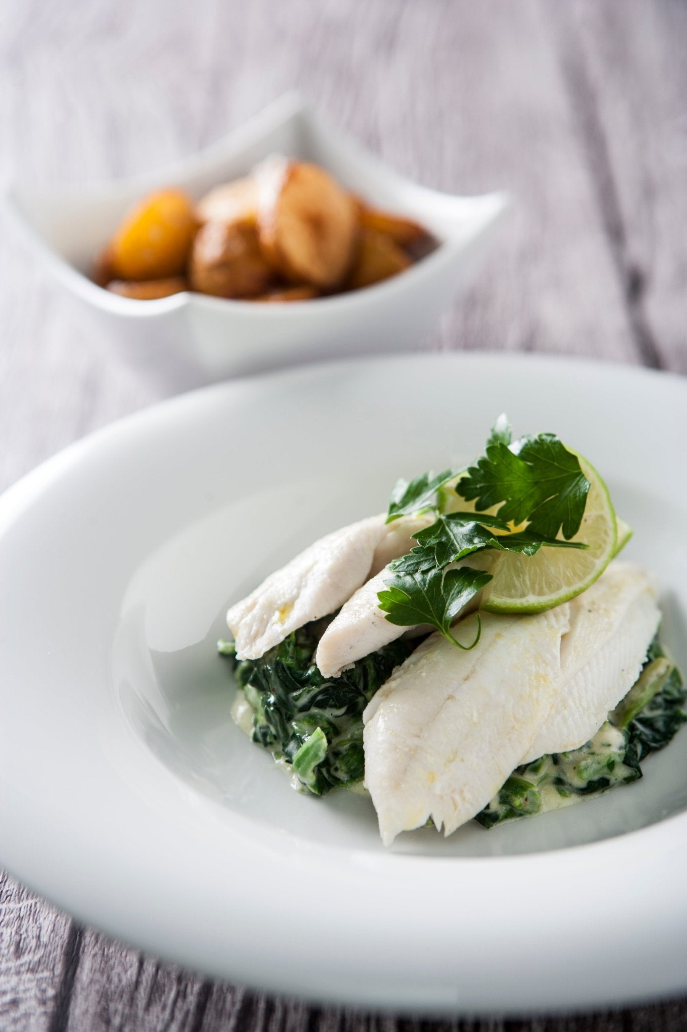 Spættefilet med flødestuvet spinat - Kystfisken